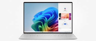 A laptop with a blue swirl on the screen.